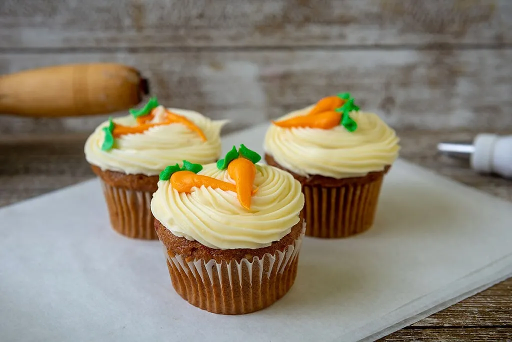 Buttercream Cupcakes, Classic cupcakes under a swirl of vanilla buttercream.